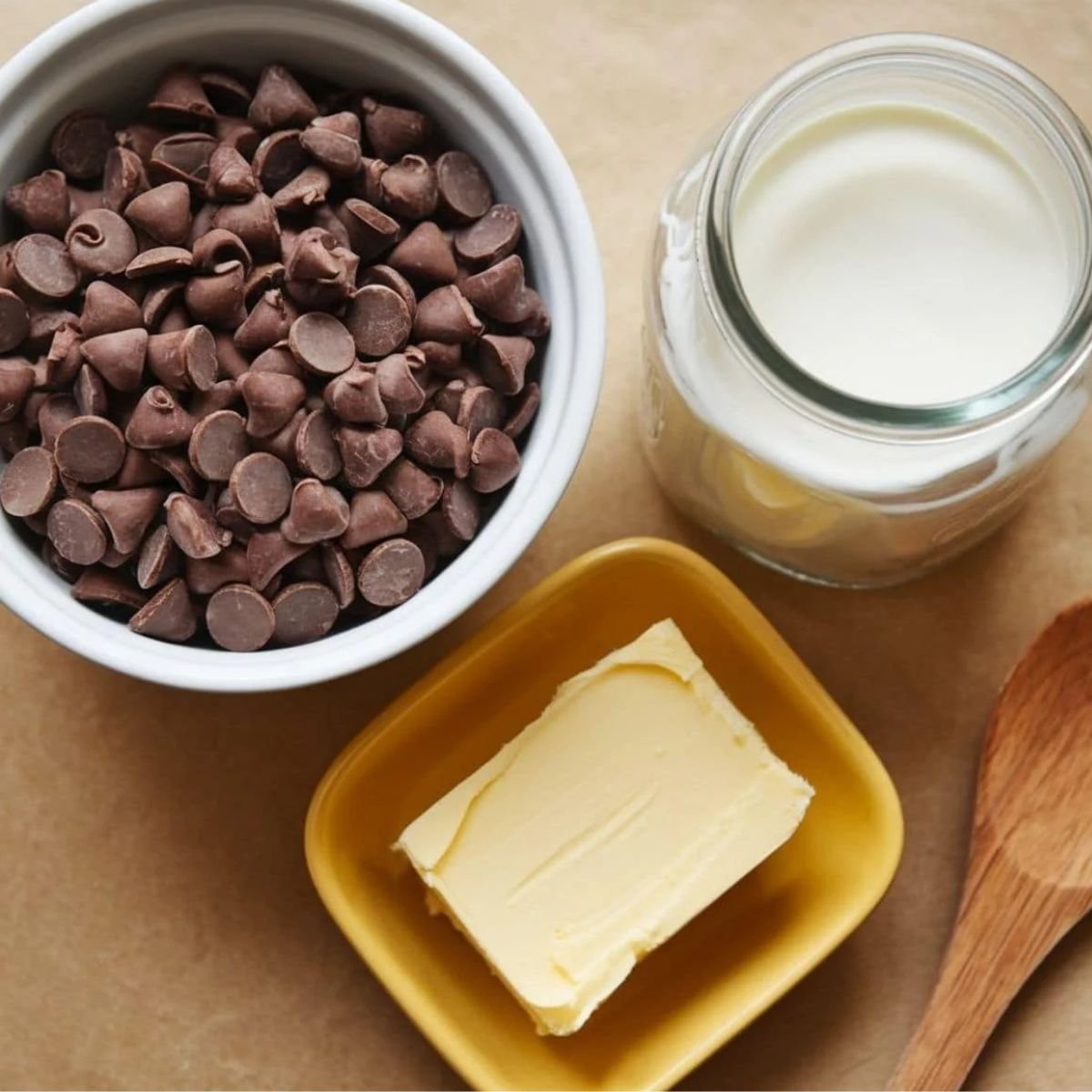 Creamy chocolate glaze ingredients for a Chocolate Pound Cake Recipe, featuring chocolate chips, butter, and heavy cream. Perfect for a rich and indulgent homemade chocolate dessert.