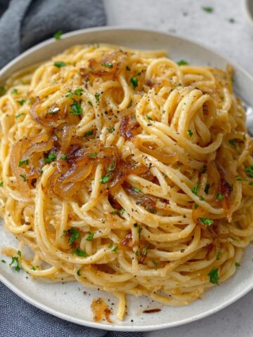 Caramelized Onion Pasta are combined in a pan, creating a flavorful and comforting dish.