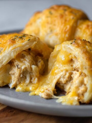 Cheesy Chicken Crescent Bake, baked to perfection with a melted, golden cheese filling oozing out from inside the flaky dough